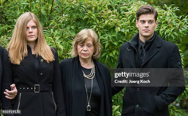 The grandchildren of decedent Joachim Fuchsberger, Jennifer and Julien-Christopher and widow Gundula 'Gundel' Fuchsberger go to the commemoration for...