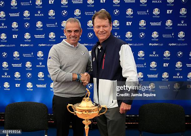 Paul McGinley , Captain of the Europe shakes hands with Tom Watson, Captain of the United States team during a press conference ahead of the 2014...