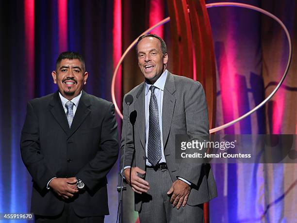Lucas Benitez and Greg Asbed accept the Clinton Global Citizen Leadership in Civil Society Award at the 8th Annual Clinton Global Citizen Awards at...