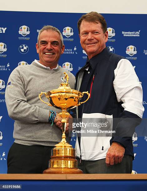 Paul McGinley , Captain of the Europe shakes hands with Tom Watson, Captain of the United States team during a press conference ahead of the 2014...