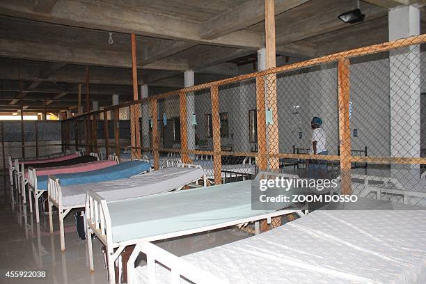 This picture taken on September 21, 2014 shows beds inside the "Island Clinic", a new Ebola treatment centre that opened in Monrovia. Liberia...