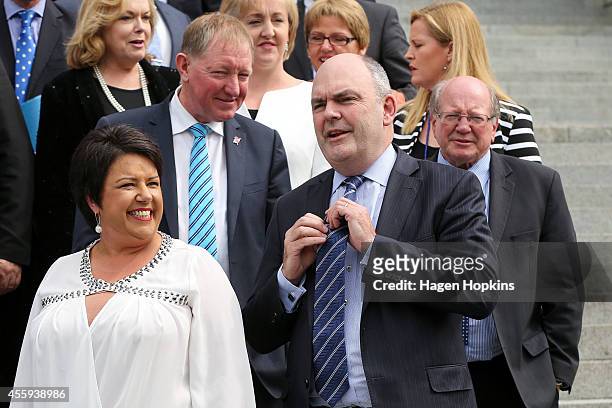 To R, Paula Bennett, Nick Smith, Steven Joyce and Lindsay Tisch look on during the National Party team photo at Parliament House on September 23,...