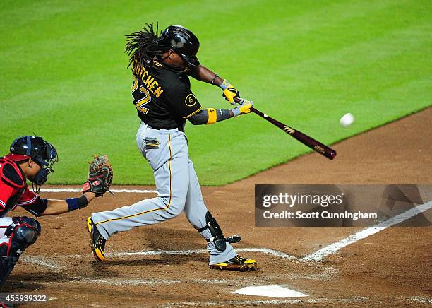 Andrew McCutchen of the Pittsburgh Pirates hits a sixth inning solo home run against the Atlanta Braves at Turner Field on September 22, 2014 in...