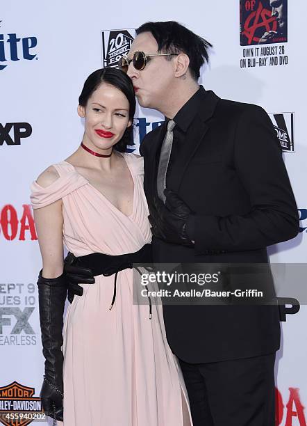 Singer Marilyn Manson and Lindsay Usich arrive at FX's 'Sons Of Anarchy' premiere at TCL Chinese Theatre on September 6, 2014 in Hollywood,...