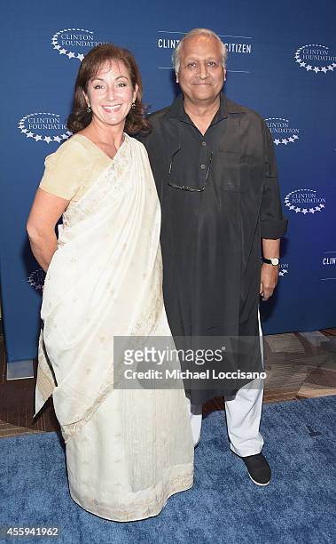 Senior Advisor to Barefoot College Meagan Fallone and Barefoot College founder Bunker Roy attends the 8th Annual Clinton Global Citizen Awards at...