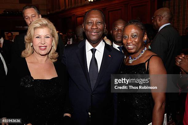 First Lady of Ivory Coast Dominique Folloroux-Ouattara, Ivory Coast President Alassane Ouattara and Rosalind McLymont, Executive Editor at The...