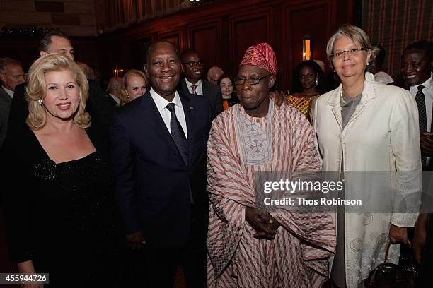 First Lady of Ivory Coast Dominique Folloroux-Ouattara, Ivory Coast President Alassane Ouattara, Oluṣẹgun Ọbasanjọ, former President of Nigeria and...