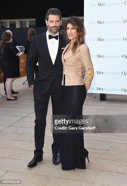 Louis Dowler and Jennifer Esposito attend the season opening of "The Marriage of Figaro" at The Metropolitan Opera House on September 22, 2014 in New...