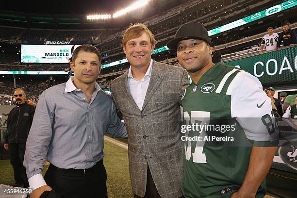 Former New York Jets stars Wayne Chrebet, Chad Pennington and Lavaranues Coles attend the NY Jets VS Chicago Bears game at MetLife Stadium on...