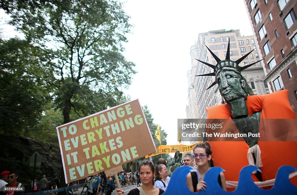 MANHATTAN, NY - SEPTEMBER 21: Members of People's Puppets to Oc