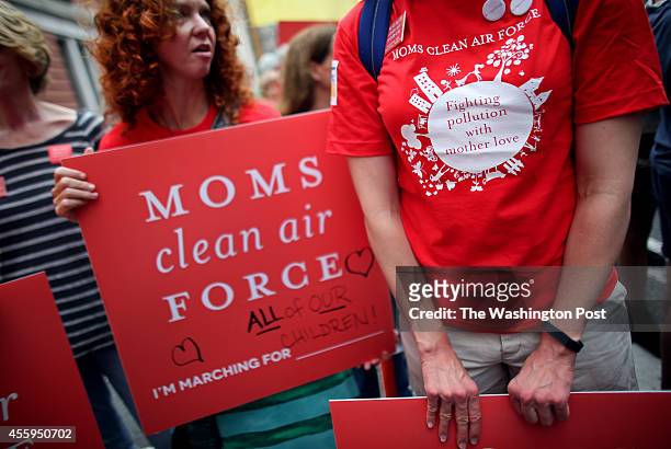 Michelle Ramoni and Kelly Nichols, from the Moms Clean Air Force, march in the People's Climate March in Manhattan, NY, on September 21, 2014.