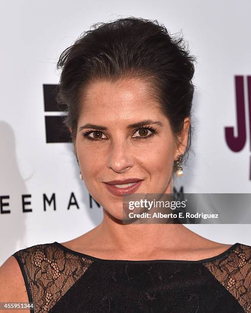 Actress Kelly Monaco arrives to the Los Angeles premiere of "Jimi: All Is By My Side" at ArcLight Cinemas on September 22, 2014 in Hollywood,...