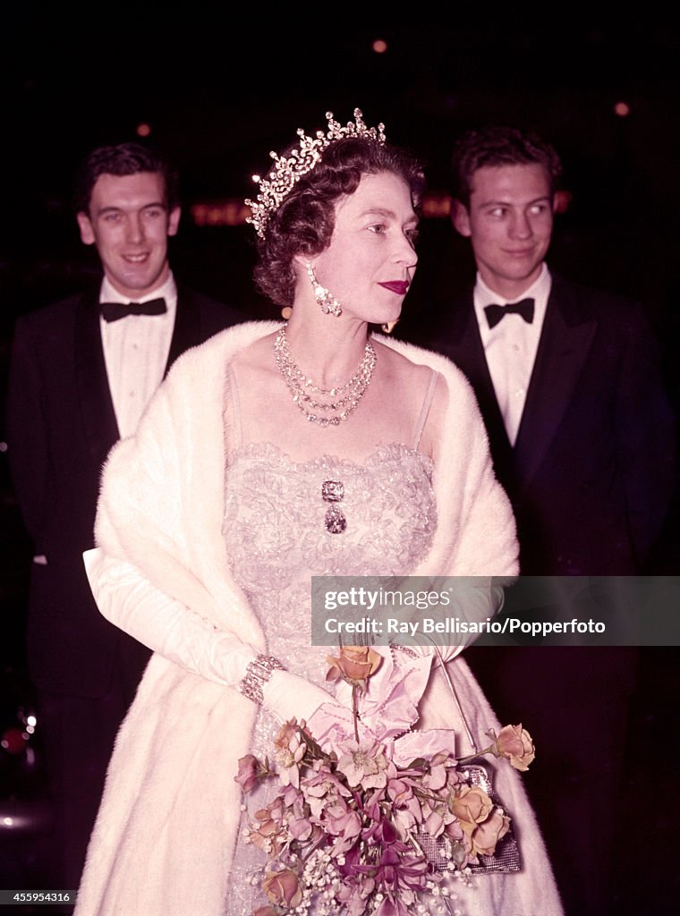 Queen Elizabeth II Visits The London Theatre