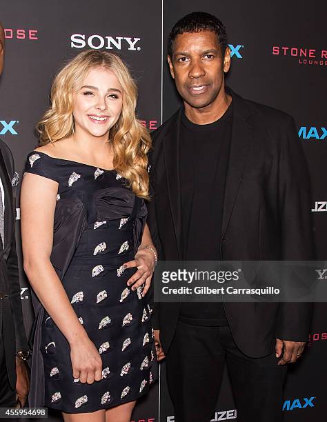 Actress Chloe Grace Moretz and actor Denzel Washington attend "The Equalizer" New York Screening at AMC Lincoln Square Theater on September 22, 2014...