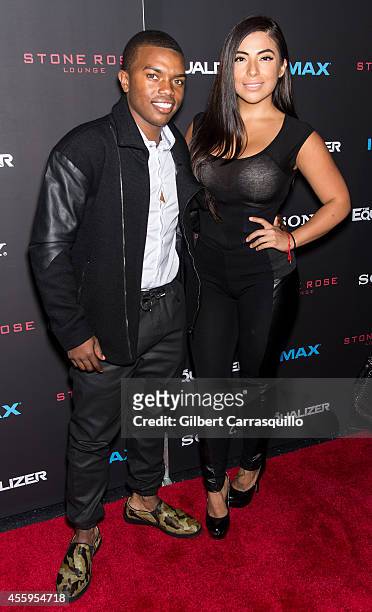 Actor Marc John Jefferies and Guest attend "The Equalizer" New York Screening at AMC Lincoln Square Theater on September 22, 2014 in New York City.