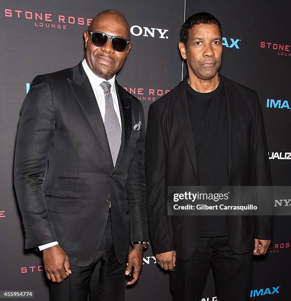 Film director Antoine Fuqua and actor Denzel Washington attend "The Equalizer" New York Screening at AMC Lincoln Square Theater on September 22, 2014...