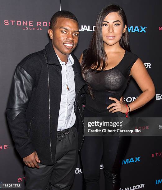 Actor Marc John Jefferies and Guest attend "The Equalizer" New York Screening at AMC Lincoln Square Theater on September 22, 2014 in New York City.