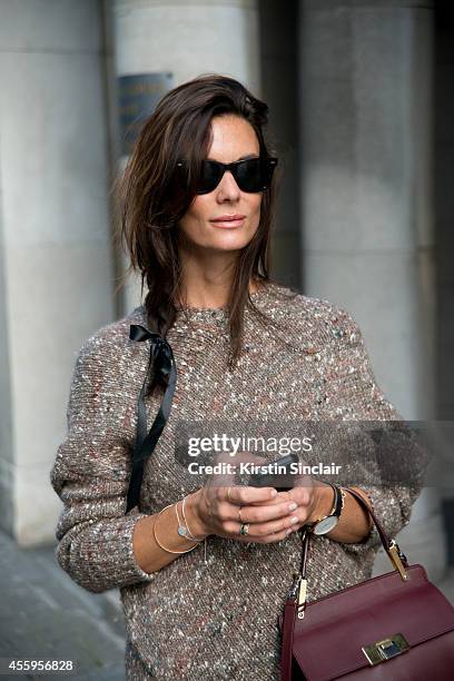 Fashion Blogger Hedvig Opshaug is wearing a Stella McCartney dress, Balenciaga bag, Rayban sunglasses on day 4 of London Collections: Women on...