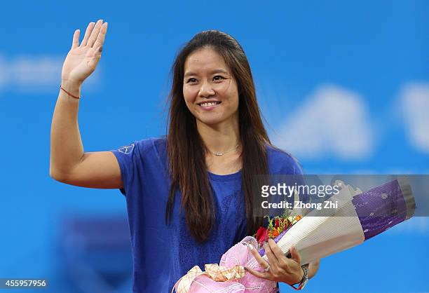 Player Na Li of China during her Retirement Ceremony on day three of 2014 Dongfeng Motor Wuhan Open at Optics Valley International Tennis Center on...
