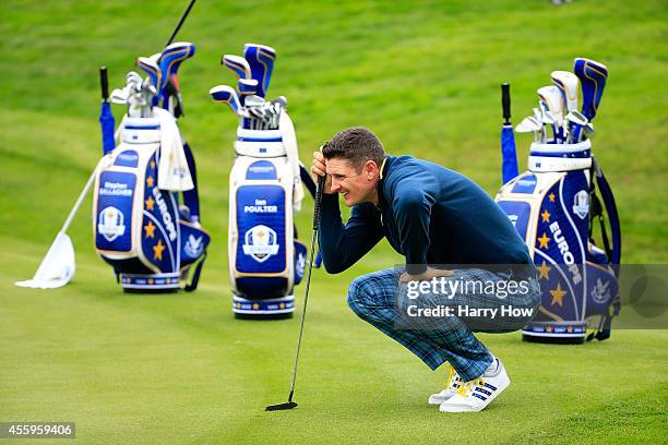 Justin Rose of Europe lines up a putt during practice ahead of the 2014 Ryder Cup on the PGA Centenary course at the Gleneagles Hotel on September...
