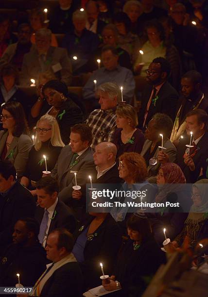 National Cathedral, with the Newtown Foundation holds a vigil in memory of the Newtown shooting victims on December 2013 in Washington, DC. Family...
