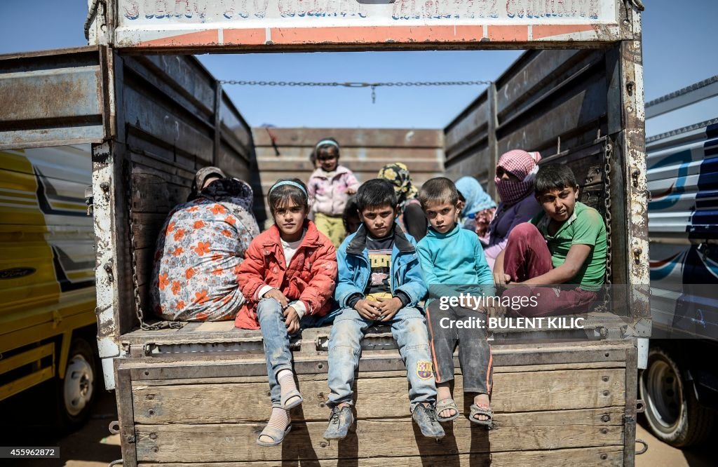 SYRIA-TURKEY-IRAQ-KURDS-CONFLICT-REFUGEES