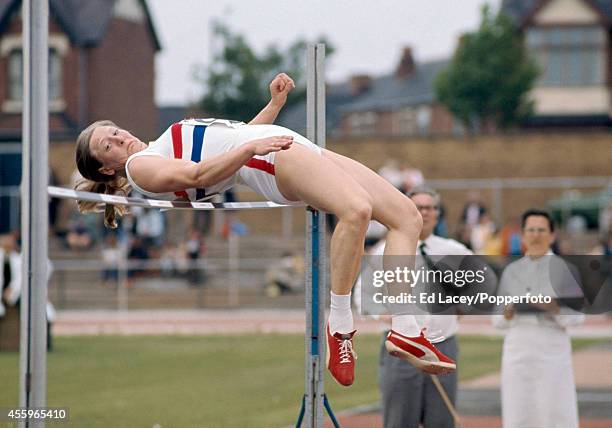 Olympic athlete Mary Peters of Great Britain competing in the high jump section of the pentathlon at the Women's Amateur Athletics Association...