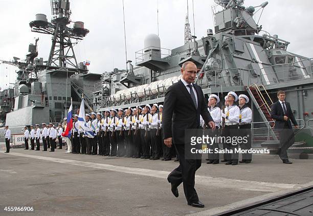 Russian President Vladimir Putin visits the destroyer Vice-Admiral Kulakov at the Naval Base of Black Sea Fleet on September 23, 2014 in...
