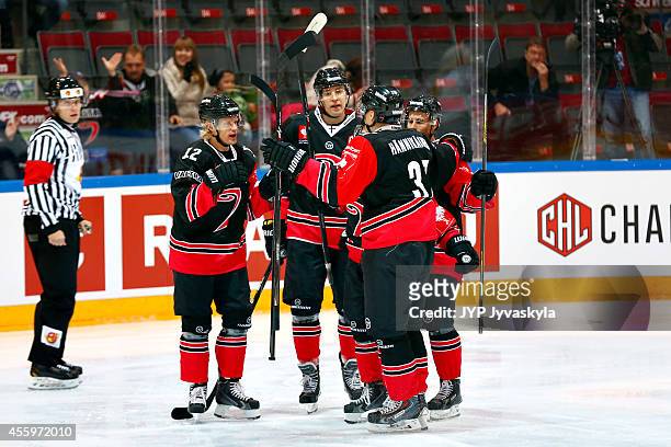 Players of JYP celebrate the opening goal during the Champions Hockey League group stage game between JYP Jyvaskyla and HV71 Jonkoping on September...