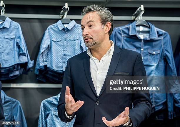 French general director of clothing company Kiabi International Jean-Christophe Garbino gives a press conference in Faches-Thumesnil, northern...