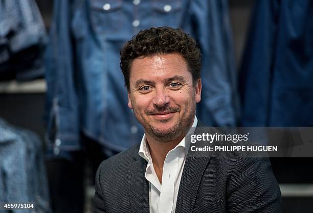 French director of clothing company Kiabi's French branch Philippe Thirache poses during a press conference in Faches-Thumesnil, northern France, on...