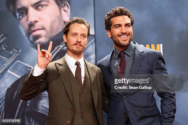 Tom Schilling and Elyas M'Barek attend the premiere of the film 'Who am I' at Zoo Palast on September 23, 2014 in Berlin, Germany.