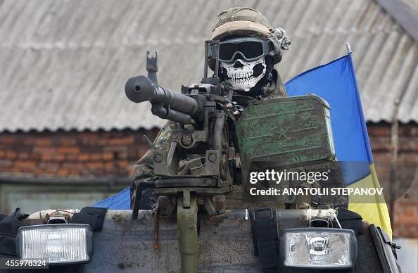 Mascal Ukraine Ukrainian serviceman wears a mask depicting a skull on September 23 ...