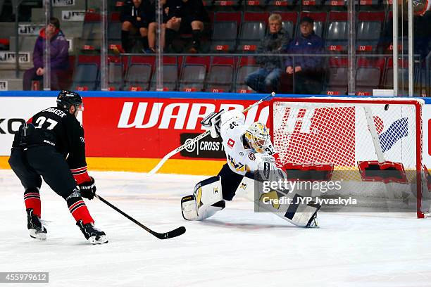 Eric Perrin of JYP celebrates the game winning goal by penalty during the Champions Hockey League group stage game between JYP Jyvaskyla and HV71...