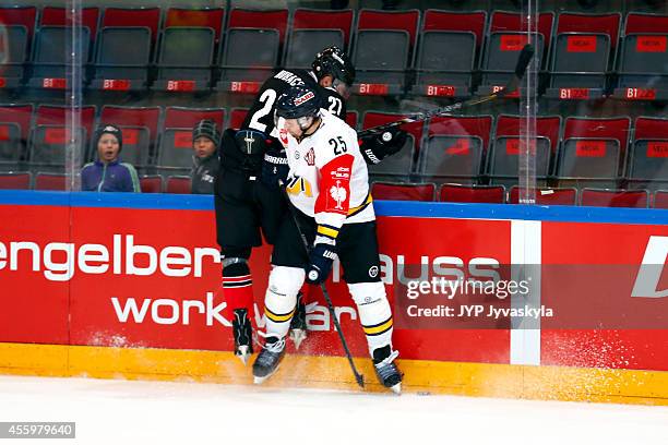 Petr Hubacek of JYP gets hit by the boards during the Champions Hockey League group stage game between JYP Jyvaskyla and HV71 Jonkoping on September...