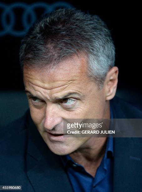 Elche's coach Fran Escriba looks on during the Spanish league football match Real Madrid CF vs Elche CF at the Santiago Bernabeu stadium in Madrid on...