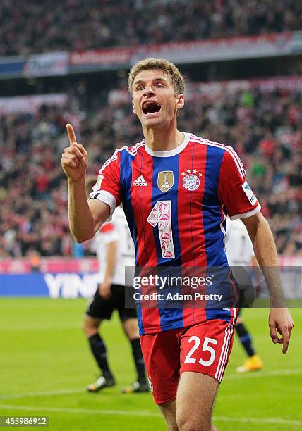 Thomas Mueller of Muenchen celebrates scoring a goal during the Bundesliga match between FC Bayern Muenchen and SC Paderborn 07 at Allianz Arena on...