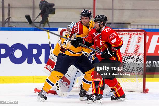 Chris Abbott of Lulea Hockey in fight whit Aaron Gagnon of Lukko Rauma infront of Oskari Setanen Goaltender of Lukko Rauma during the Champions...