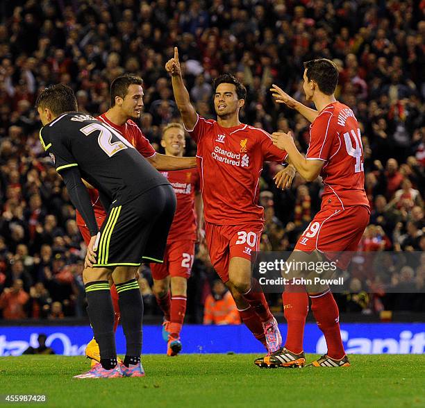 Suso of Liverpool celebrates his goal during the Capital One Cup Third Round match between Liverpool and Middlesbrough at Anfield on September 23,...