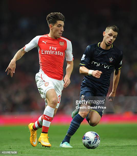 Hector Bellerin of Arsenal under pressure from Morgan Schneiderlin of Southampton during the Capital One Cup 3rd match between Arsenal and...