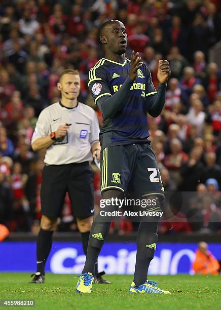 Albert Adomah of Middlesbrough reacts after missing his penalty during the Capital One Cup Third Round match between Liverpool and Middlesbrough at...