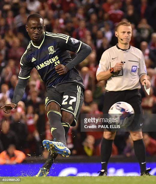 Middlesbrough's Ghanaian midfielder Albert Adomah misses the decisive penalty during their 14-13 penalty shoot out loss in the English League Cup...