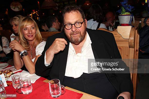 Ottfried Fischer and his girlfriend Simone Brandlmeier attend the 'GoldStar TV Wiesn' during Oktoberfest at Weinzelt, Theresienwiese on September 23,...