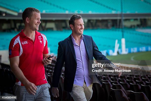 Jude Bolton and Ryan O'Keefe walk during a Sydney Swans AFL media session at Sydney Cricket Ground on September 24, 2014 in Sydney, Australia.