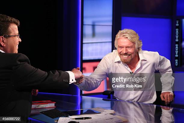 Sir Richard Branson talks with host Neil Cavuto on "Cavuto" on FOX Business Network at FOX Studios on September 23, 2014 in New York City.