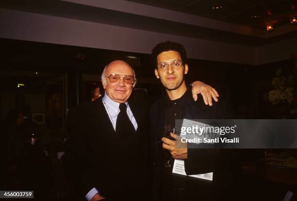 Movie Director Francesco Rosi with actor John Turturro on November 3, 1995 in New York, New York.