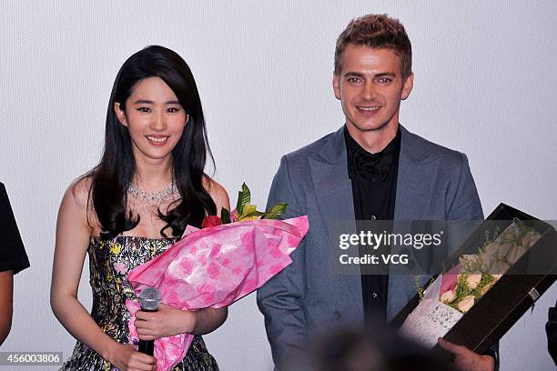 Actress Liu Yifei and actor Hayden Christensen attend Nick Powell's new movie "Out Cast" press conference on September 23, 2014 in Guangzhou, China.