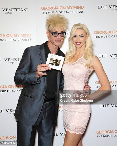 Magician/comedian Murray SawChuck and his wife, entertainer Chloe Louise Crawford, arrive at "Georgia On My Mind: Celebrating The Music Of Ray...