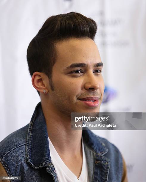Latin Recording Artist Prince Royce attends the Latin GRAMMY Cultural Foundation presention of a Latin GRAMMY In Schools at Los Angeles High School...