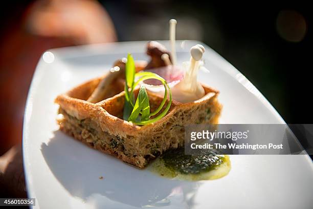 Chef Bart Vandaele created this waffle with mushrooms for guests attending a barbecue at his home in Alexandria, Virginia on September 06, 2014.